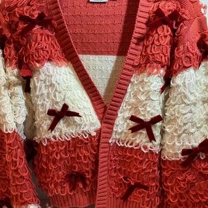 Cardigan sweater light weight over a plain dress for evenings